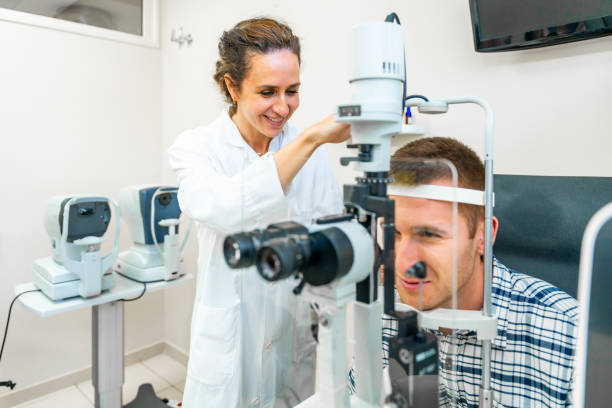 istock Young man at the optometrist getting his eyes checked 2098904452