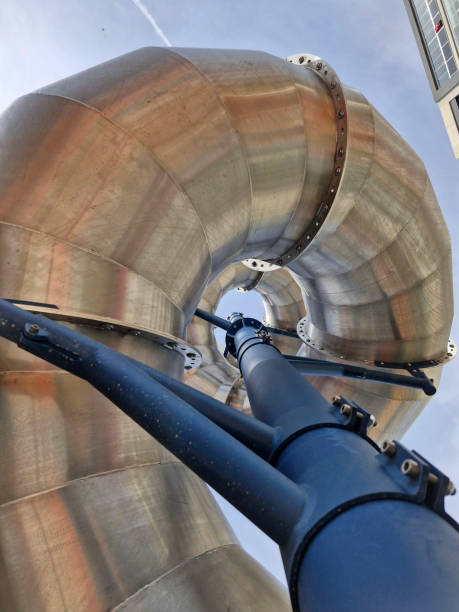 Metal tunnel curved slide. Free children's playground built by the public government in Izmir
