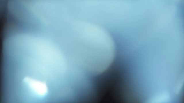 background with the effect of glare of light. Light leaks from the lens flash creating an abstract background animation