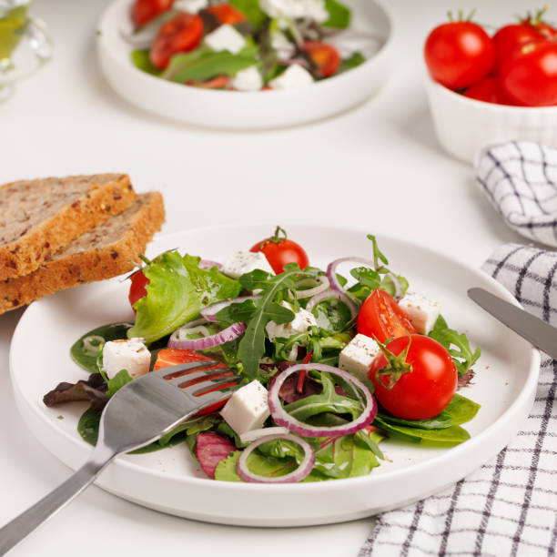 istock salad with tomatoes and feta 2099023827