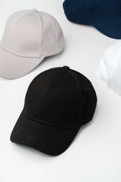 istock Different Colors of Hats on a White Background 2099037366