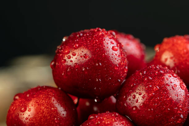 istock delicious collected and wet cherry berries with pits 2099065811