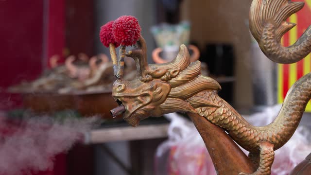 Traditional Chinese style dragon shaped boiling kettle emits the steam