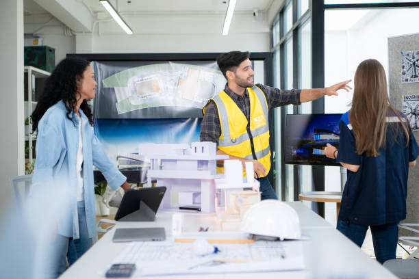istock Engineers, architects, and designers collaborate to design a building that employs natural energy. 2099092735