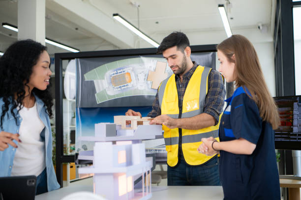 istock Engineers, architects, and designers collaborate to design a building that employs natural energy. 2099093941