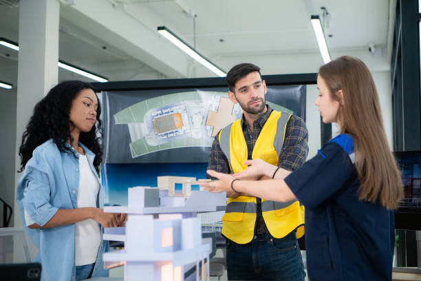 istock Engineers, architects, and designers collaborate to design a building that employs natural energy. 2099093951