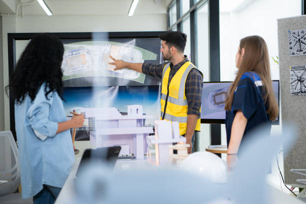 istock Engineers, architects, and designers collaborate to design a building that employs natural energy. 2099097149