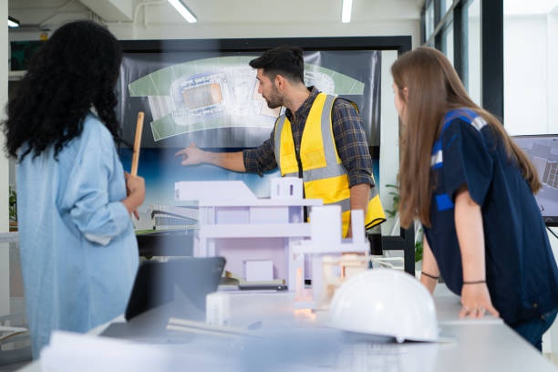 istock Engineers, architects, and designers collaborate to design a building that employs natural energy. 2099097152