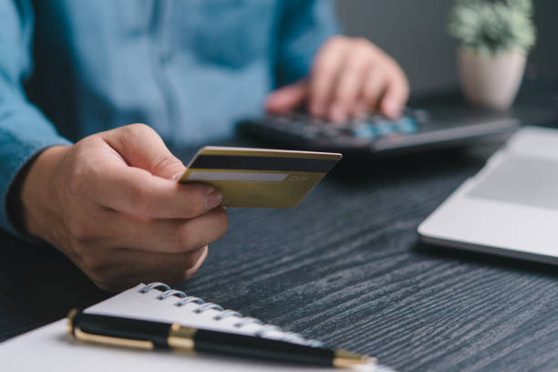 istock A person is holding a credit card 2099106126