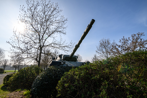 Armored Tank rides on off-road. Tank exercises in the countryside