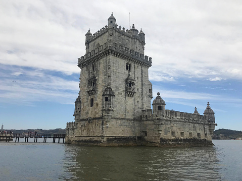 Lisbon Portugal- 07/31/2019 :  view of the Tower of Belem near  the Tagus river in Lisbon Portugal Belem Tower