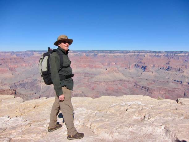 The rock walls, cliffs and gorges give the Grand Canyon in Arizona its ever-changing hues: rust reds, dusty pinks and slate-grey, along with the numerous shades of brown on a November morning.