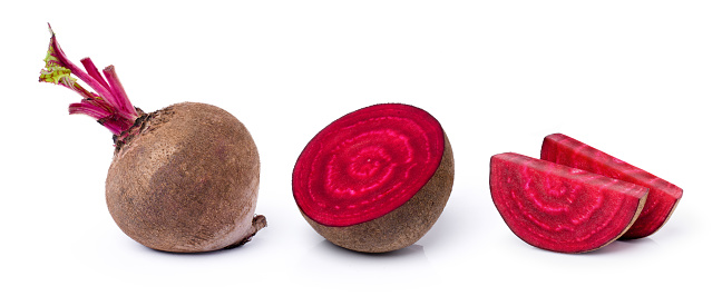 Beetroot (beet root) and cut in half sliced isolated on white background.