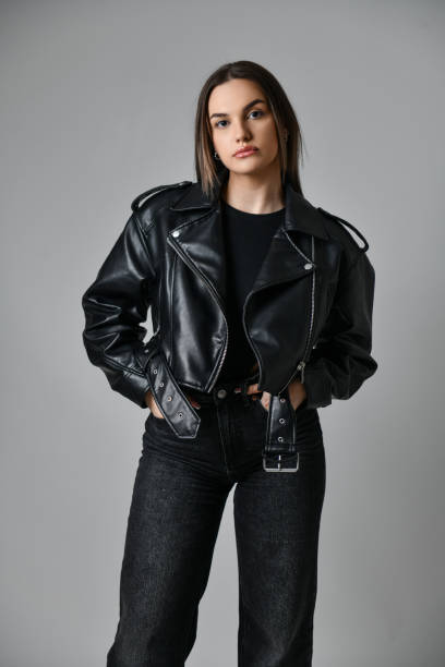 istock Front View Of Beautiful Female In Leather Jacket And Jeans 2099180838