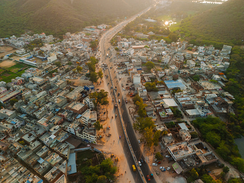 Aerial view of highway through Jaipur, India at sunset