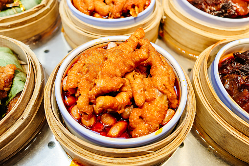 Chicken feet stewed in red chilli sauce