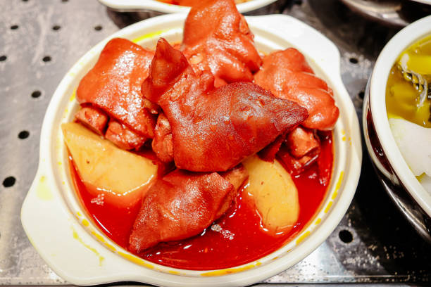 Pork leg stewed in red chilli sauce