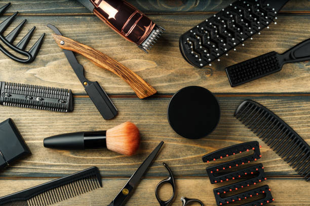 istock Set of professional barber tools on wooden table 2099220562