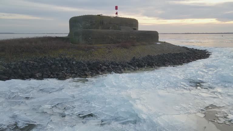 Aerial view of abandoned war bunker during winter, kornwerderzand, Netherlands