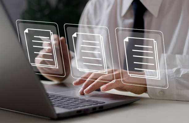 istock Concept of document management using symbols on a virtual screen, ERP 2099254345
