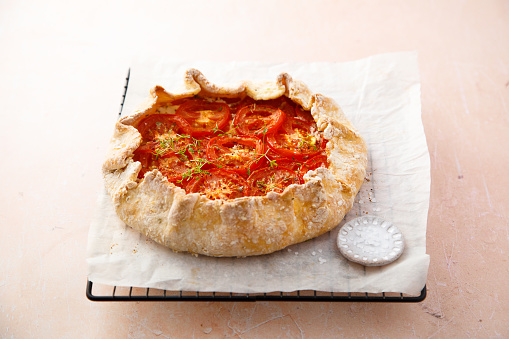 Homemade tomato galette with herbs
