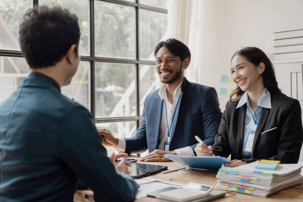istock Successful people of various nationalities, creative business team presenting discuss ideas Brainstorm ideas, work as a team, have a meeting atmosphere with smiles at the conference room. 2099315923