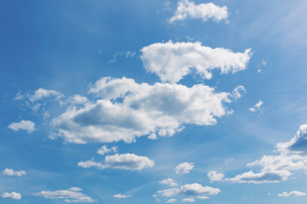 white clouds in the blue sky. white light cloudy heaven,good weather. summer sky. heaven and infinity. curly clouds on a sunny day. beautiful bright blue background. - 11705 photos et images de collection