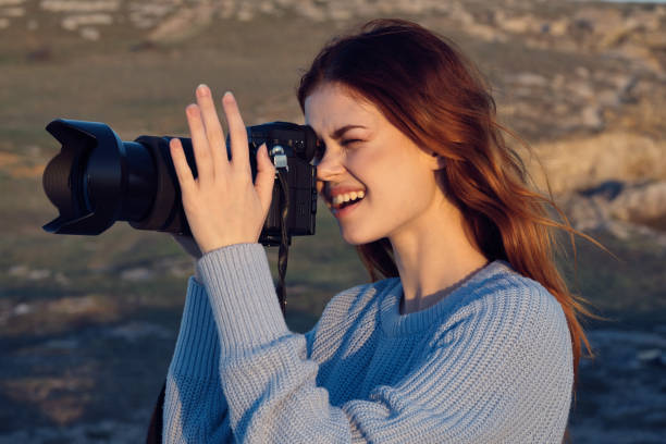 istock woman professional photographer outdoors hobby work landscape 2099346293