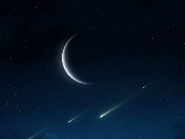 Moon and falling meteorites in the sky.