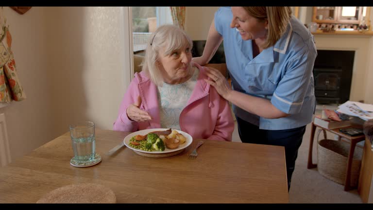 Caregiver Serving a Home Cooked Meal