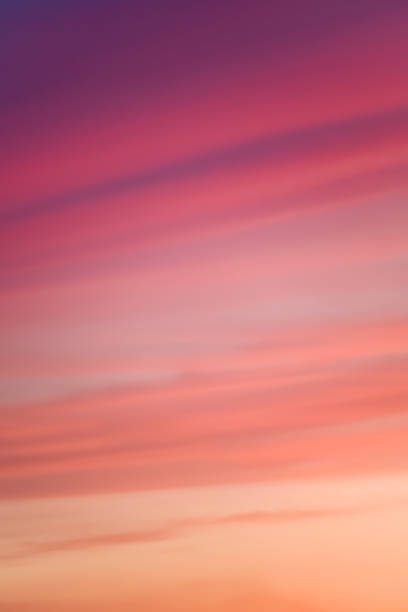 istock Blurry sunset clouds in warm hues, ideal for abstract concepts 2099400196