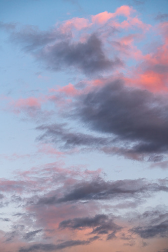 The sky's soft pastel hues post-sunset offer a tranquil scene for creative and wellness projects