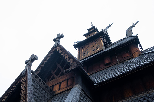 A photo of the Stave Church in The Norwegian Museum of Cultural History.