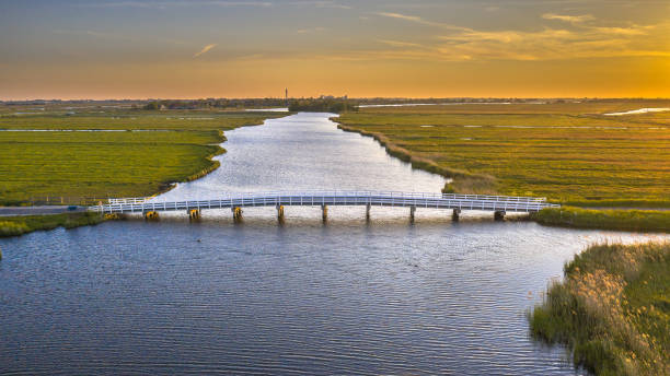 istock Long wooden bridge 2099423382