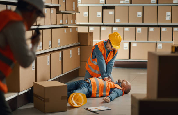 istock Worker performing CPR emergency procedure on an unconscious person 2099434483