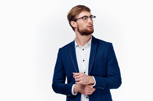 Young man looking up daydreaming  - Studio shot