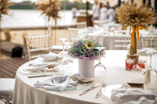 Wedding table setting decorated with flowers and dishes