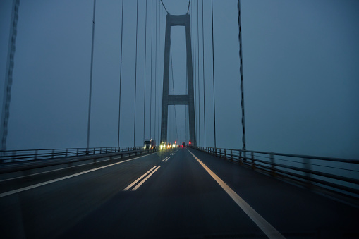 Great Belt Bridge in Denmark overcast day at dusk. Bridge between Zealand and Funen