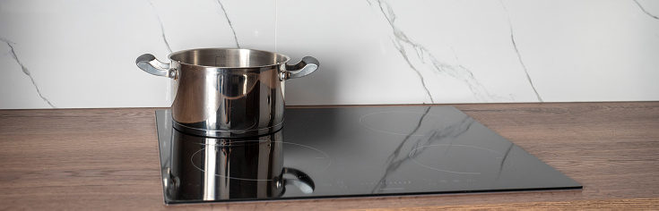 Stainless steel pot on induction hob