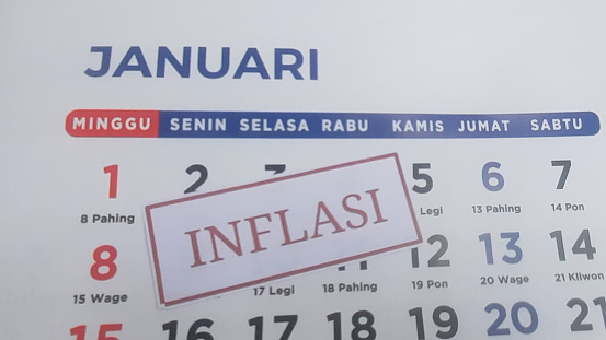 inflation label with January month calendar background