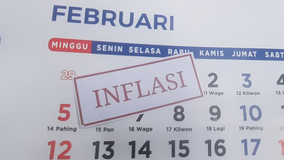 inflation label with February month calendar background