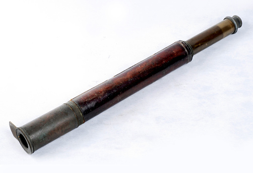 Antique brass telescope from the 19th century.