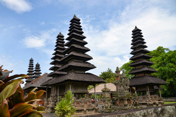 istock Old traditional Balinese temple with thatched roof 2099575971