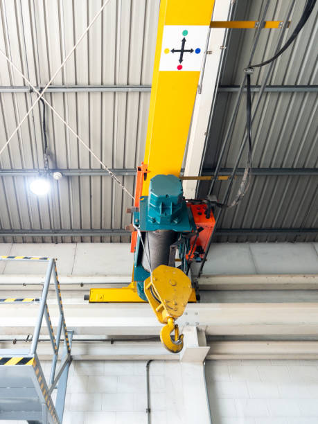 istock The electric hoist with the metal hook. 2099592921
