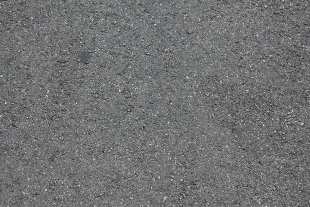 istock Texture of a nicely paved asphalt road 2099624583