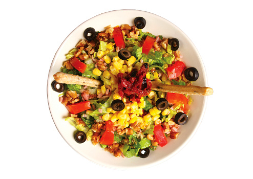 top view of salad with olives and corn