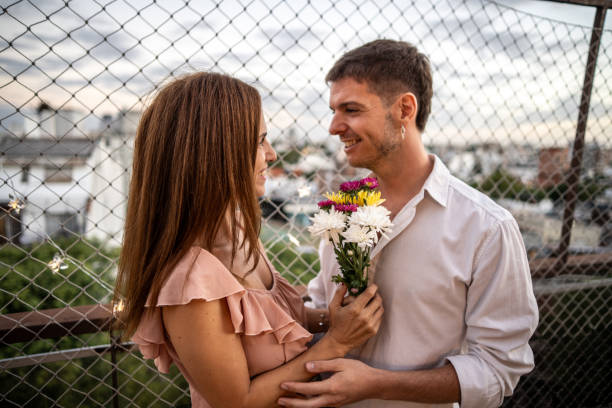 Couple in love embracing on the rooftop