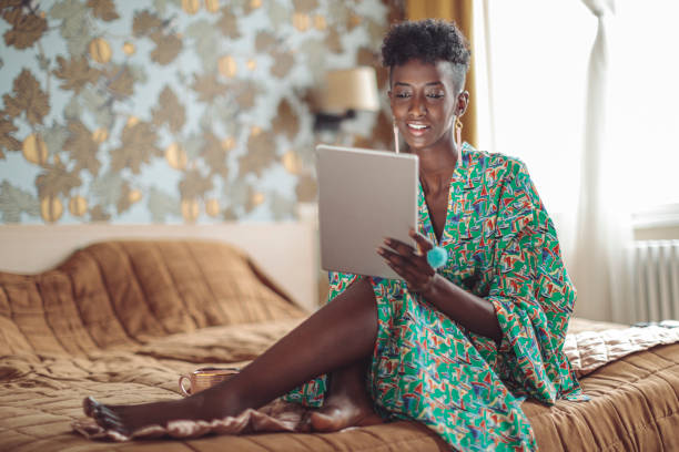 istock Young woman at home 2099660603