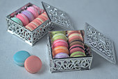 Artificial mini-French macarons with various colors.