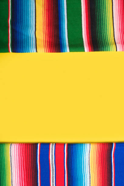 istock Serape on yellow background. Cinco de mayo background. 2099666427